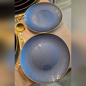 Two (2) blue saucer or salad plates with gold brush rim